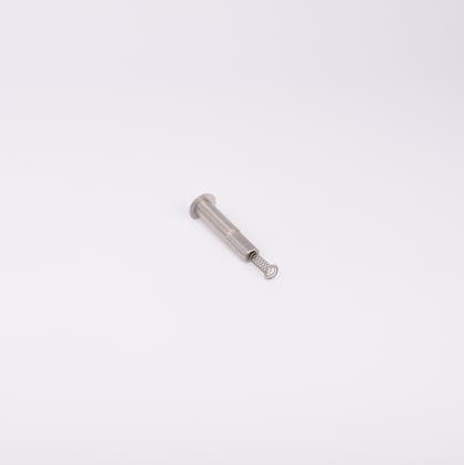 En metallisk cylinderformad komponent med en fjäder som sticker ut från ena änden.