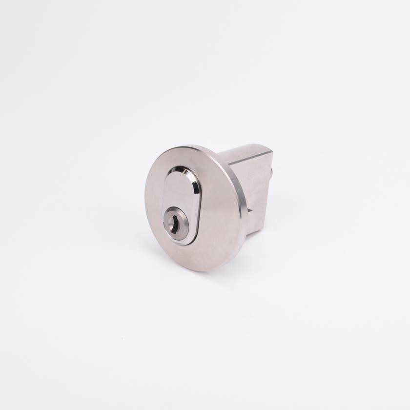 Cylindriskt metallås med nyckelhål i mitten, avsett för dörrar eller skåp.