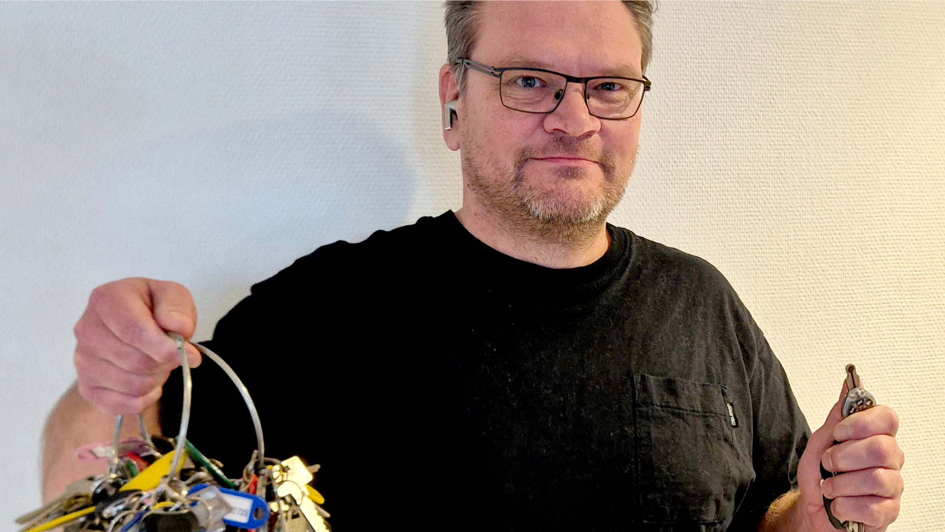 En person med en stor nyckelknippa