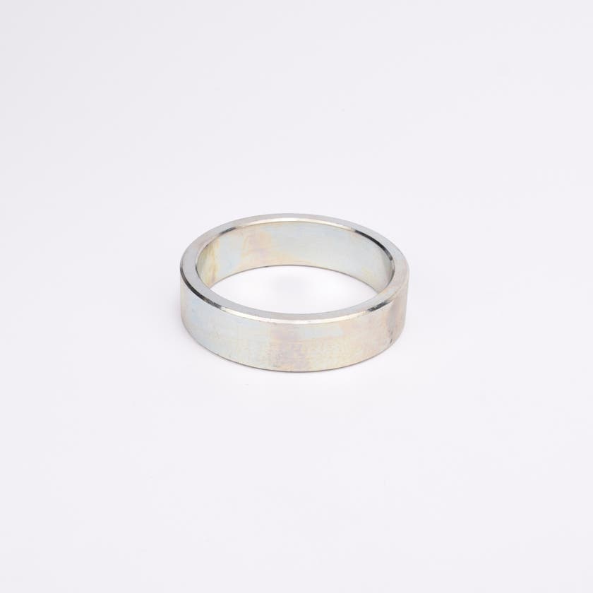 Rund metallisk trimring.