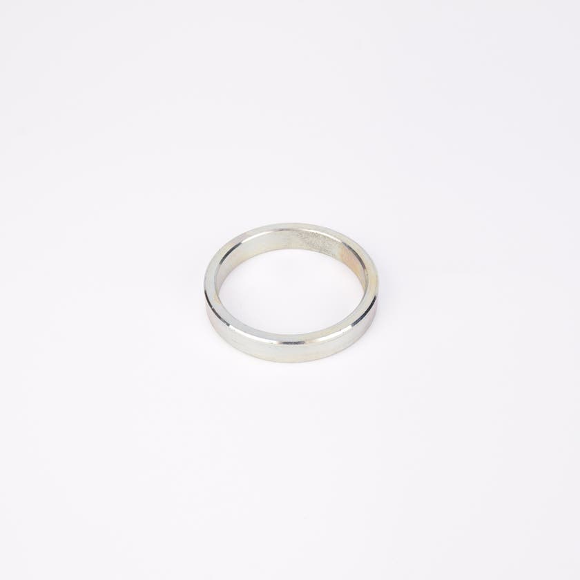 Rund metallisk trimring.