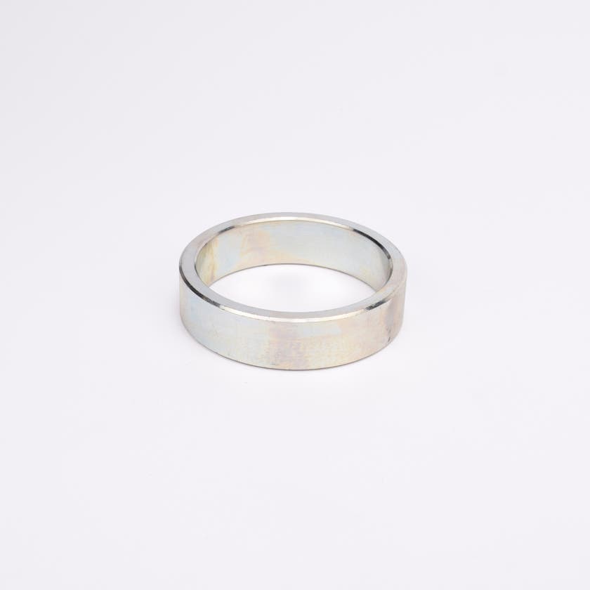 Rund metallisk trimring.