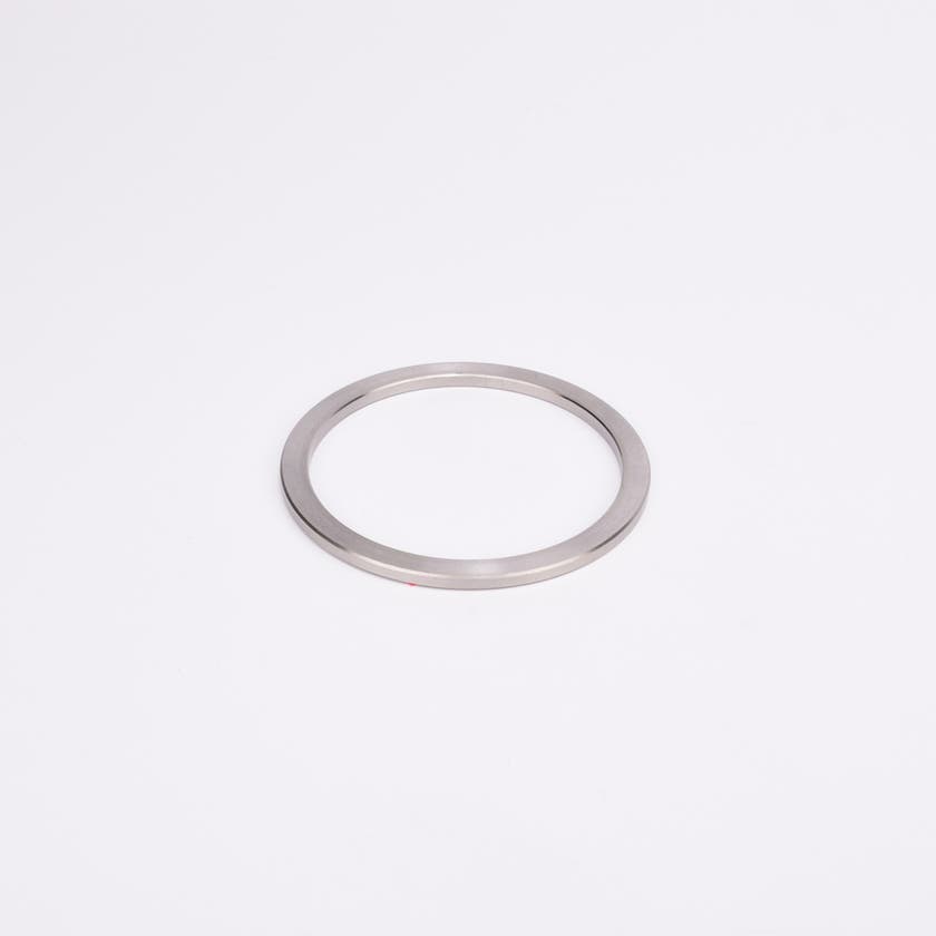 Rund metallisk trimring.