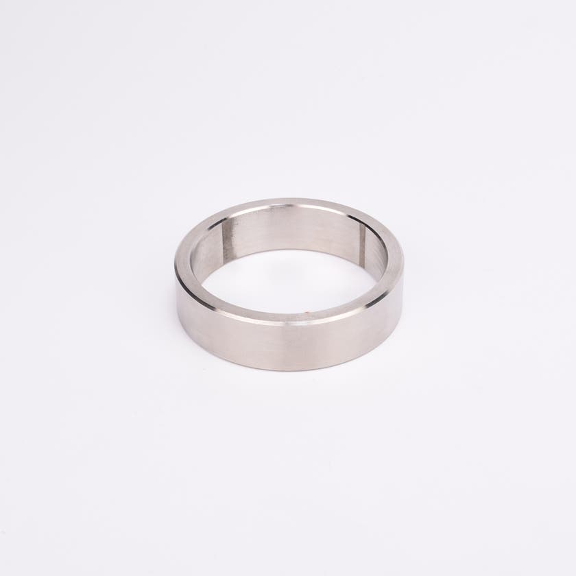 Rund metallisk trimring.