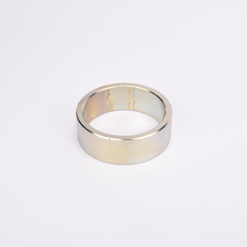 Rund metallisk trimring.