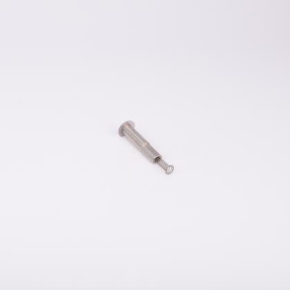 En metallisk cylinderformad komponent med en fjäder som sticker ut från ena änden.