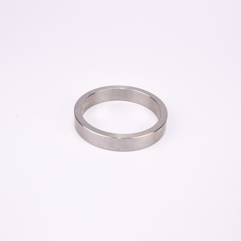 Rund metallisk trimring.