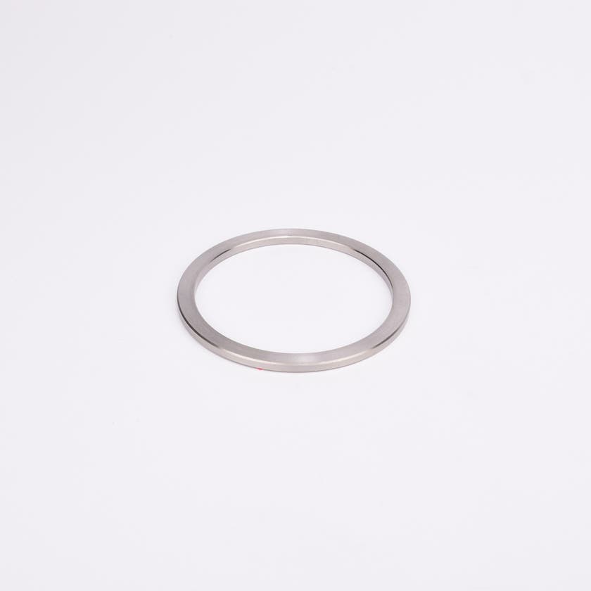 Rund metallisk trimring.