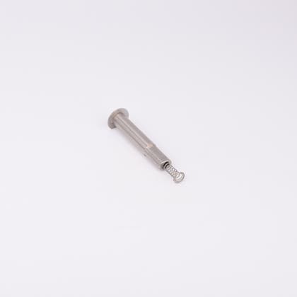 En metallisk cylinderformad komponent med en fjäder som sticker ut från ena änden.