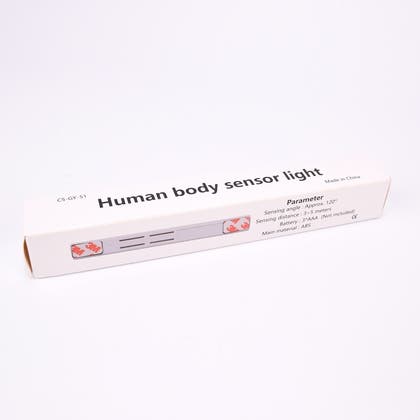 Rektangulär kartong med en lampa.