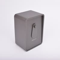 Grått fasadnyckelskåp i metall med rundade hörn och vridbar skyddskåpa.