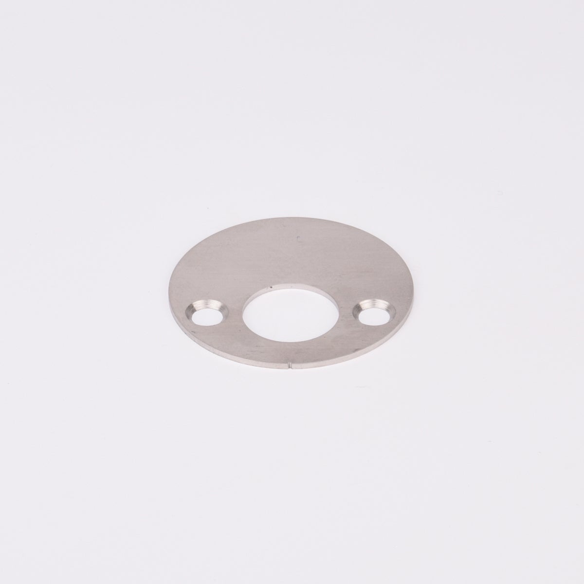 Rund täckbricka i metall med tre hål.