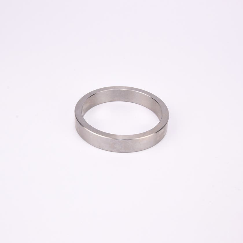 Rund metallisk trimring.