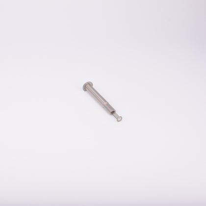 En metallisk cylinderformad komponent med en fjäder som sticker ut från ena änden.